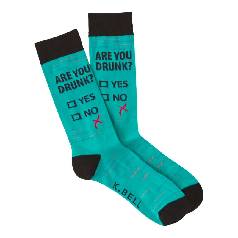 K Bell Not Drunk Sock is a Teal Background with Black Cuffs, Heels and Toes. "Are You Drunk?" is the Question on this Sock. The Answers are with boxes for YES or For NO. There is a Red X below where perhaps someone missed by accident or on purpose the boxes. Now you need to decide!