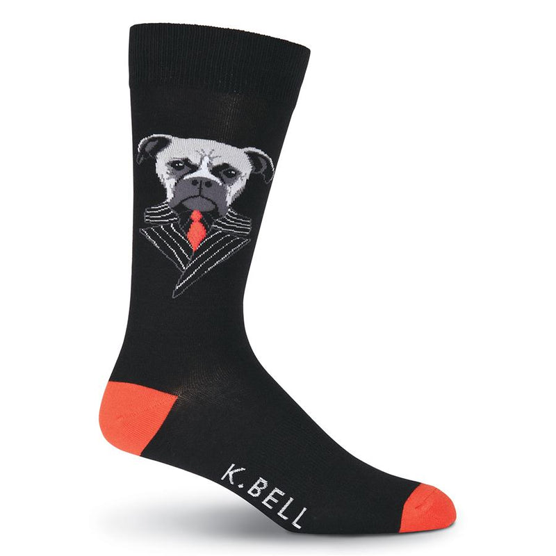K Bell Mens Boxer Suit Sock has a Boxer dog in a Pinstripe Suit. He is designed with Light Grey. Medium Grey, Dark Grey and Black. His Suit is Black with Light Grey Pinstripe. He wears a Black Shirt and Red Tie. The background is Black and the Heels and Toes are Red.