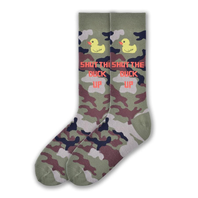 On a Camouflage background you see a Little Rubber Ducky at the top of the sock. Below in Bright Red Letters reads, "Shut the Duck Up".