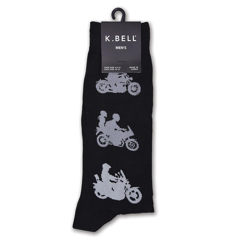 K Bell Mens Motorcycle Sock starts with a Black background. Each Motorcycle is in Dark Grey Silhouette.  One picture is of a Single Guy on a Simple Motorcycle. Next Graphic is of a Guy with a Girl passenger riding. The next Graphic is of a larger Motorcycle with a Single Rider. 