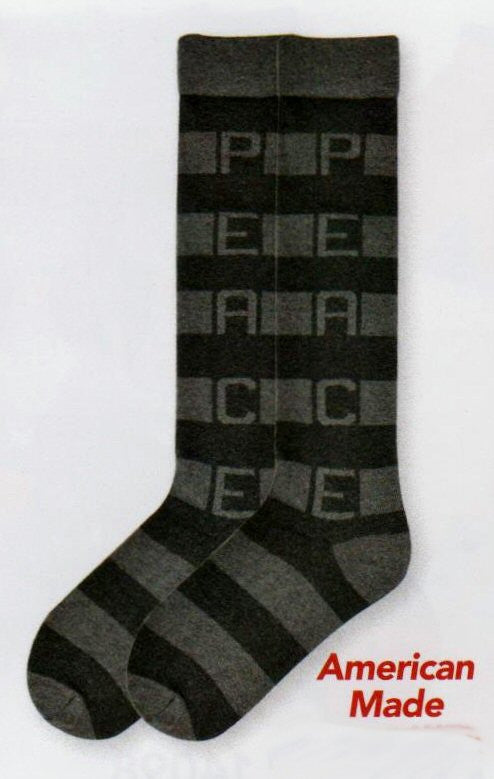 K Bell Recycled Cotton Peace Stripe Knee High Sock is in Heather Grey and Black Large Rows of Stripes. Going down the sock in Large letter is the word, PEACE.