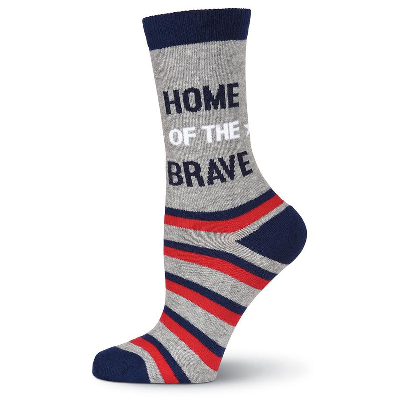 This is the second half of the medium Sock of the Pair with the Grey background. It has Navy Cuffs, Heels and Toes and Navy and Red Stripes. In the Middle of the Grey it Finishes the thought with, "Home of The Brave".