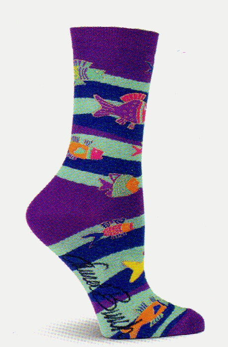 On a background of Purple starts Laurel Burch Fish and Waves Sock.  Below the Cuff are Ribbons of Cyan and Indigo. Fish of different sizes swim along the Ribbons.  They are Purple, Cyan, Magenta, Coquelicot and Saffron with Gold Thread for detail on the Fish.