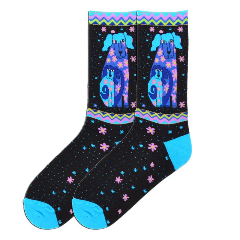 Laurel Burch Dog and Doggie Sock starts on a Black background The Heels and Toes are Teal. The Cuff is Bunting of Gold Thread Teal, Pink, Indigo and Lime. It also repeats below the Dogs. Dog and Doggie are Teal, Indigo and Purple with Pink and Yellow Flowers all over them.