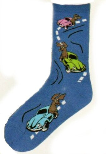 Three cars going down a road with dogs hanging out of the car window having lots of fun on this Blue Sock.