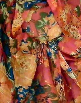 Big Flower Coral Scarf from Rapti  is beautiful to wear during warm Spring and Fall days or the cooler evenings of Summer. Brighten up a plain shift dress with all the colors!