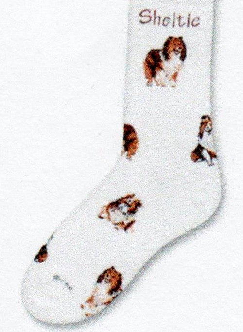 On a background of Bright White the FBF Sheltie Poses 2 Socks have in Bold Russet Print Sheltie under the Cuff. Then comes different Sheltie Dog Poses to the Toes. The Sheltie is Brown, Tan, White and Black.