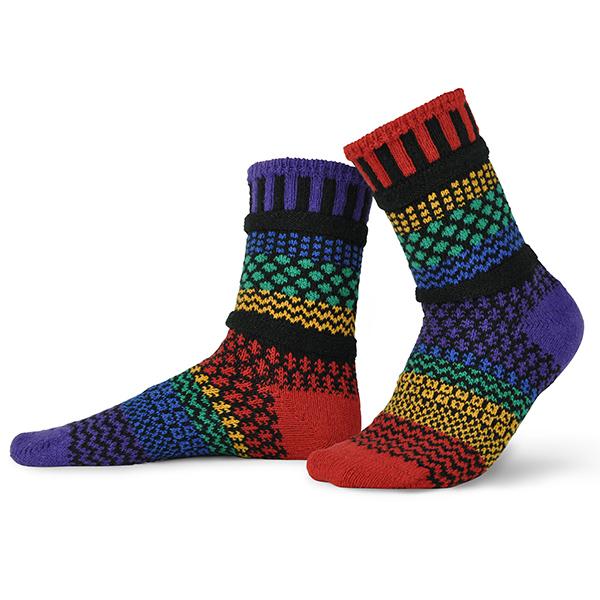 Solmate Adult Crew Gemstone Socks are Bright with Red, Emerald Green, Gold, Purple, Blue, and Black Gemstones that bounce off the light. 