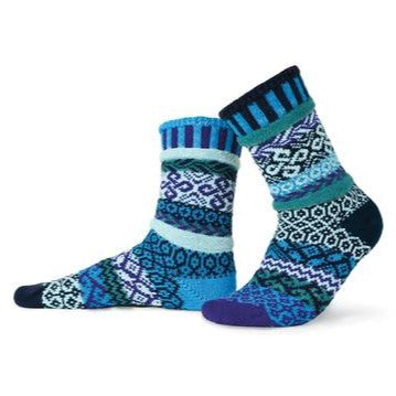 Solmate Water Sock is a Mismatched Sock. Colors are Turquoise, Purple, Jade, Navy Blue and Blue Green. Graphics are Fish.
