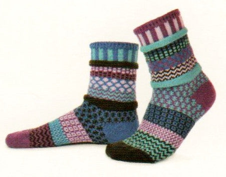 Solmate Socks Vermont Raspberry Sock is Mismatched. Colors of Purple, Turquoise. Black, Lilac and Royal Blue.