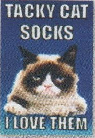 This is the Close Up to the Meme on the Sock. Grumpy Cat is in the Middle the Meme Reads, " Tacky Cat Socks I Love Them"