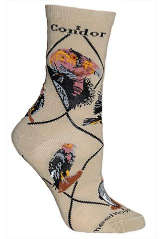 On a Tan sock with Black Argyle lines Wheel House Designs Condor Sock starts. The Condor has two Portraits in Profiles and Poses below. One in flight and the others watching from rock face for food.