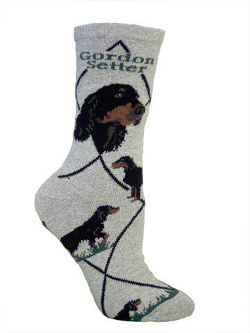 The Portraits of the Gordon Setter are in Black and Chestnut. Gordon Setter is in Bold Black print and the Diamond lines are Black. The Poses are a Hunting Stance, flushing a Pheasant, and a Show Stance.