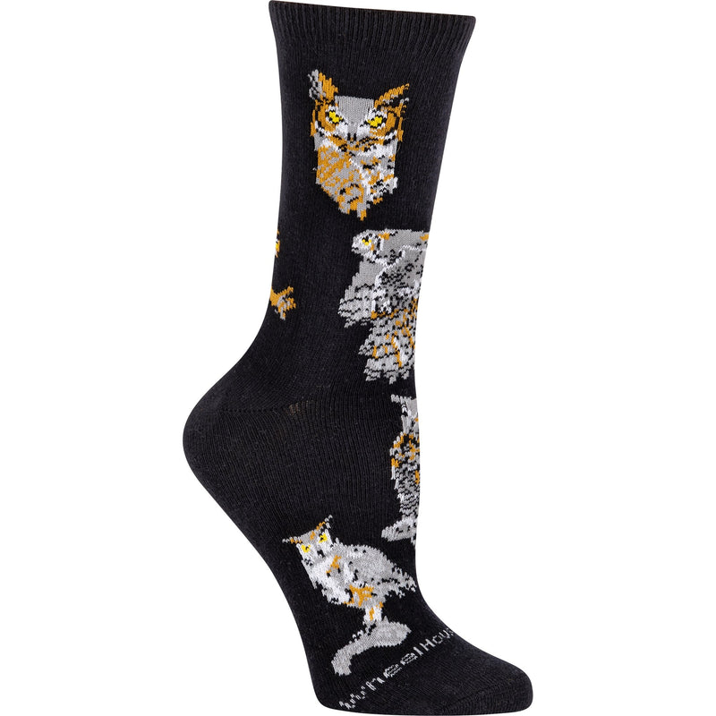 Wheel House Designs Great Horned Owl Sock starts on a Black background. The two Owls on top are Portraits, Frontal and Profile. They show the Face of Yellow Bright Eyes, Tufted Ears and Cinnamon Face. The body is Black White and Cinnamon. The Poses are on Rocks, Trees, In Flight and Ready to Strike Prey.