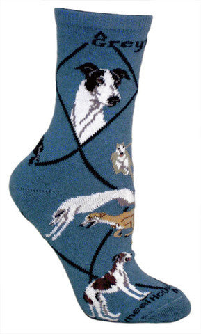 This Greyhound Sock starts on Blue background with Black Lines to make Diamonds. Greyhound is written in Bold Black Letters. Portraits of the Greyhounds are Black and White and Fawn and White. Poses show the Greyhounds running, jumping, in a stance and laying down in many colors they come in.