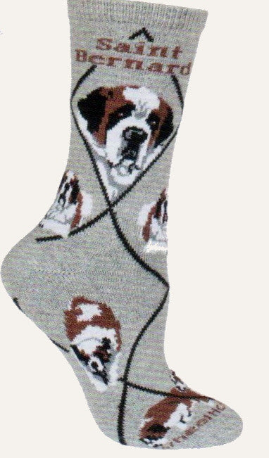 The Saint Bernard Novelty Sock starts with a Grey background. Black Lines make the Diamonds. Rust Bold Print reads Saint Bernard. The Portraits show in White, Black. and Rust. The poses show Laying Down, Stance for Show, Walking toward you and looking for someone perhaps in snow.
