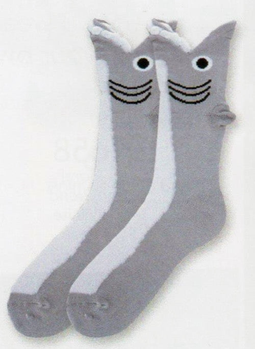 Grey and White are the main colors of this Wide Mouth Shark Sock. The mouth is the Cuff with White Puffy Teeth. Then you have the Eye and the Gills in Black. One tip of Sock comes up to be the noticeable fin out of water. The belly of the Shark is White.