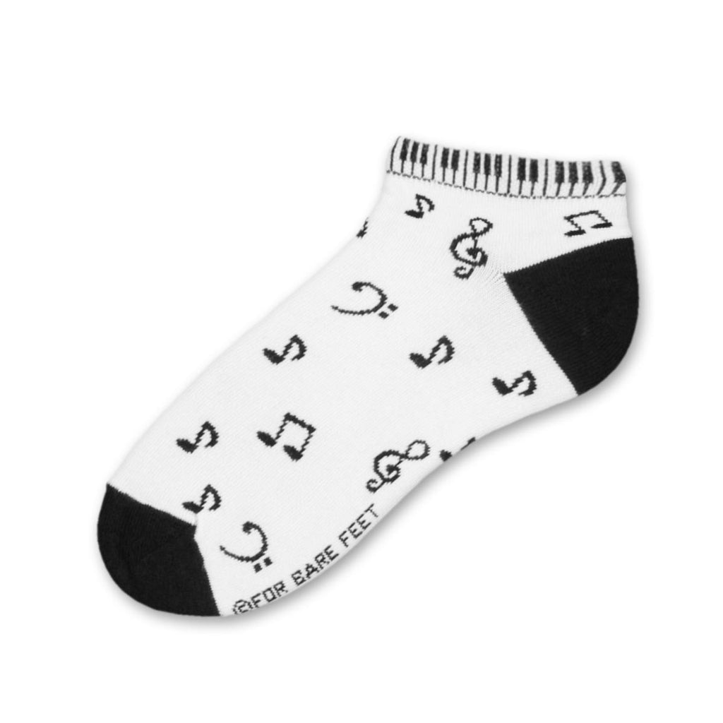 FBF Piano Keys is a No Show/Anklet Style Sock. The Cuff has the Piano Keyboard going around it. The Heels and Toes are Black. On a White background are Musical Notes and Symbols.
