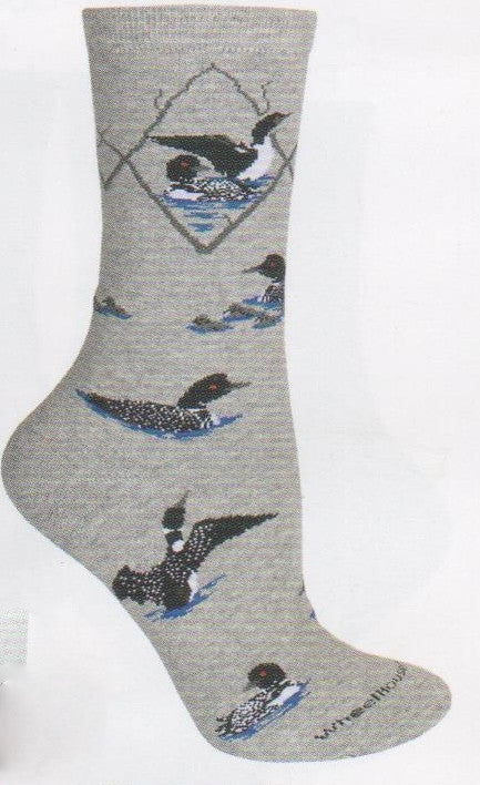Wheel House Designs Loons Novelty Sock begins on a background of Grey. They are in poses of flight and swimming.